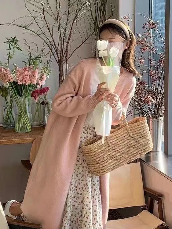Women's V-neck knitted cardigan in mid-length style with long sleeves and loose fit
