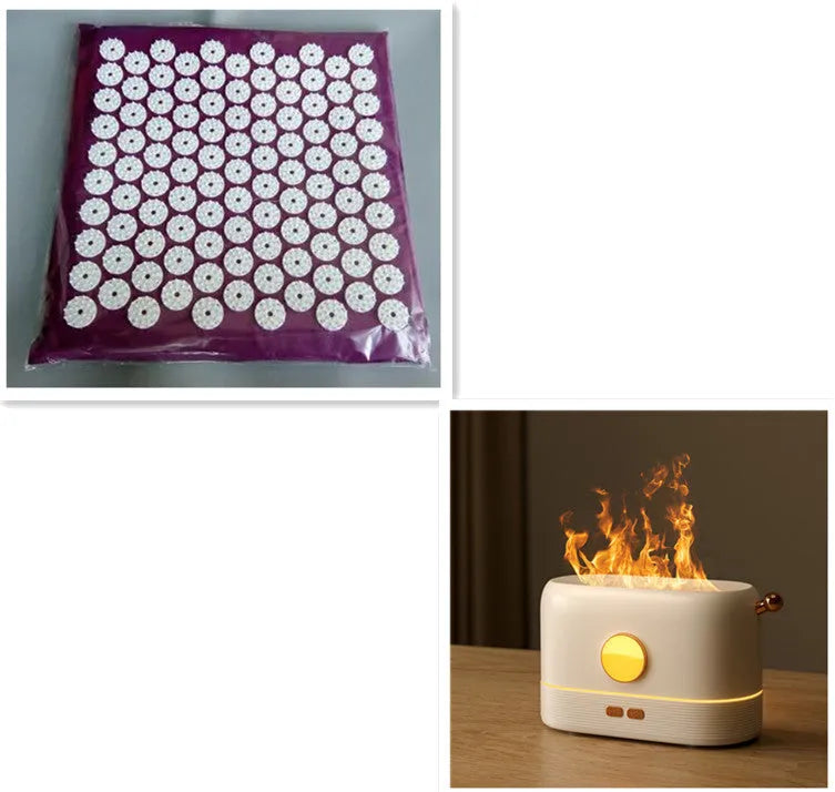 Black USB humidifier with flickering flame effect and water tank on wooden desktop