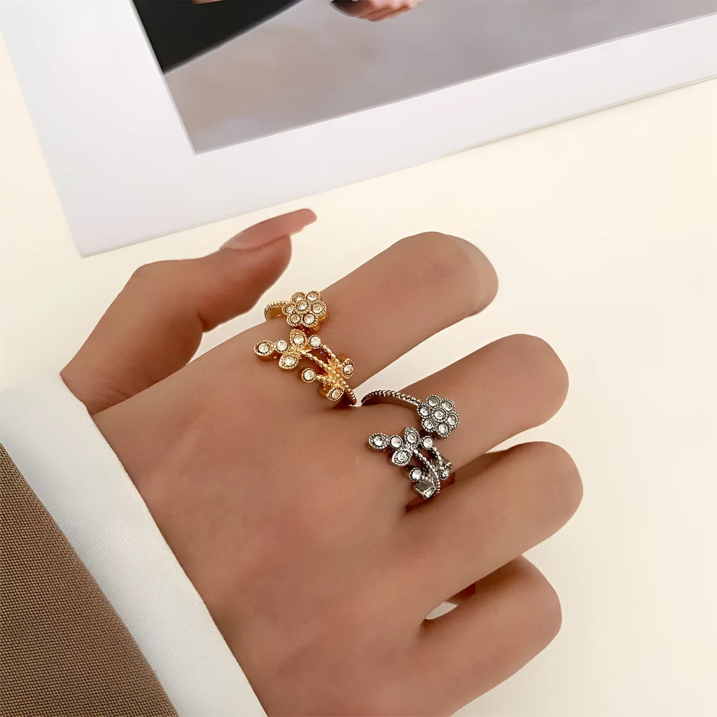 Women's open ring with diamond-cut floral leaf design in gold finish