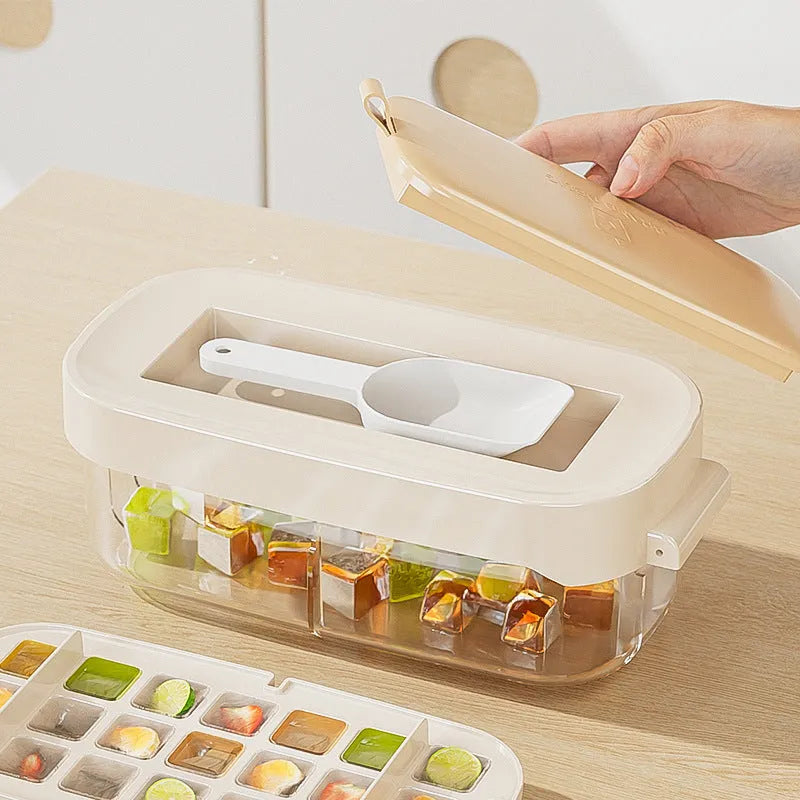 High capacity food grade plastic ice cube tray in blue with an ice shovel stored in its dedicated slot.