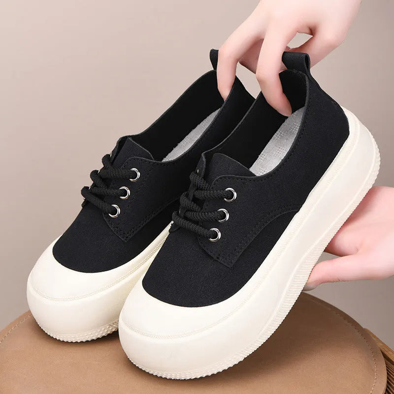 Women's beige suede platform loafers with lace-up front and round toe on a flat 4CM rubber sole.