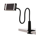 Black oversize flat panel bedside phone holder with long flexible aluminium arm on a table