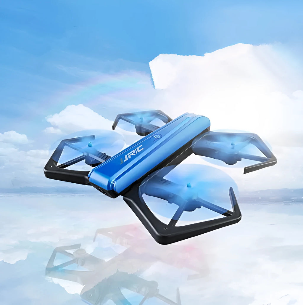 White JJRC H43WH folding drone with four arms deployed and propellers attached outdoors