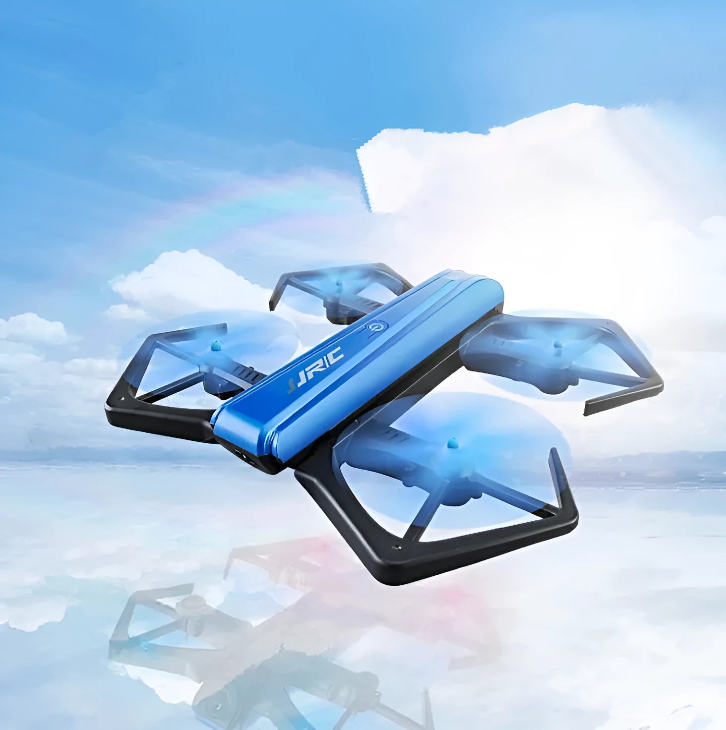 White JJRC H43WH folding drone with four arms deployed and propellers attached outdoors