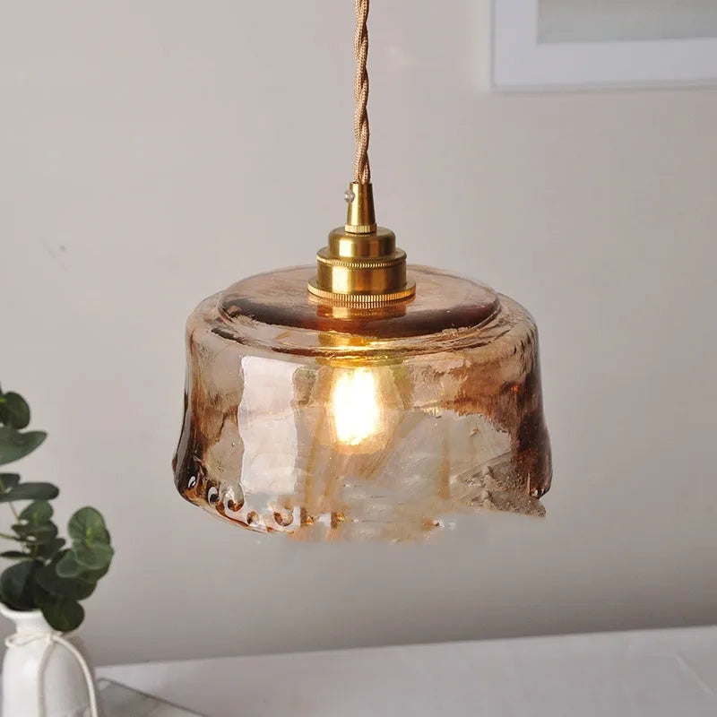 Nordic retro style brass and glass pendant chandelier light for restaurant ceilings.