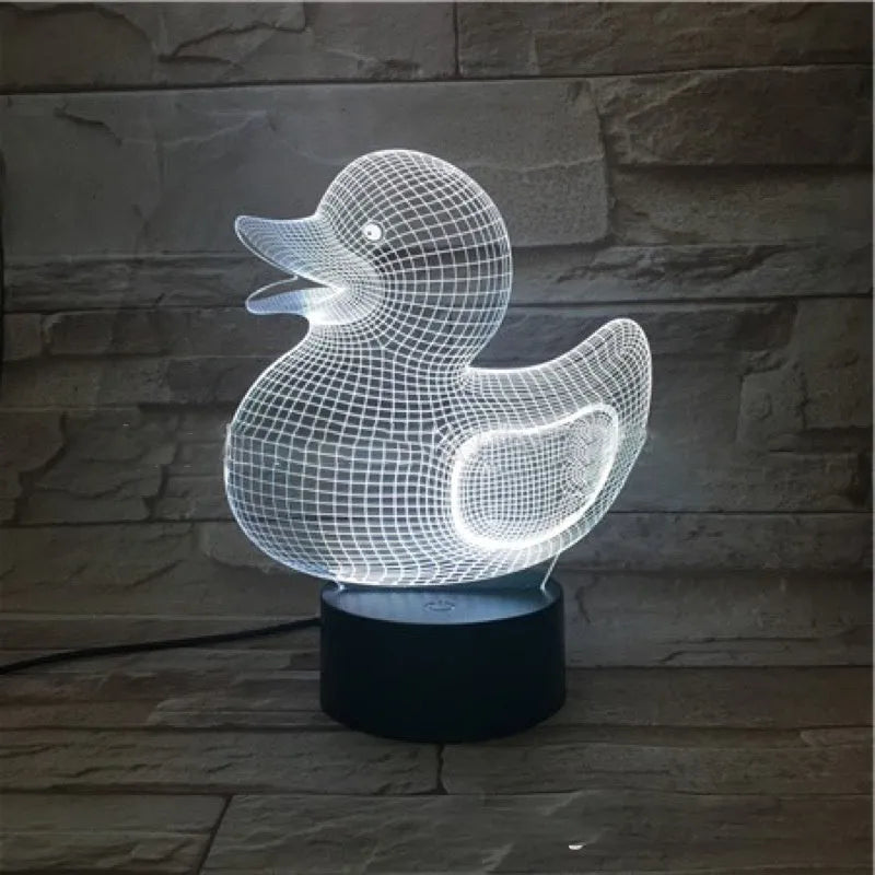 Little yellow duck 3D acrylic night light with ABS base showing seven colour LED options and remote control