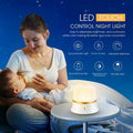White bedside touch night light showing dimming control and colour change features