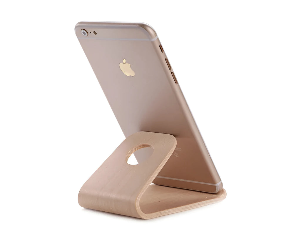 Solid wood phone stand for iPhone in natural walnut or white maple finish with minimalist bracket design
