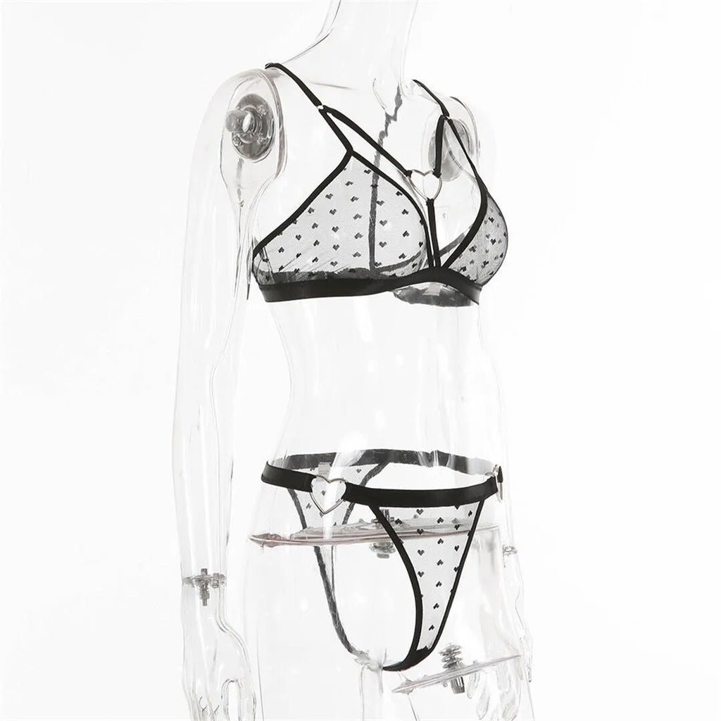 Ladies' black mesh two-piece spandex set showing top and trousers on a hanger
