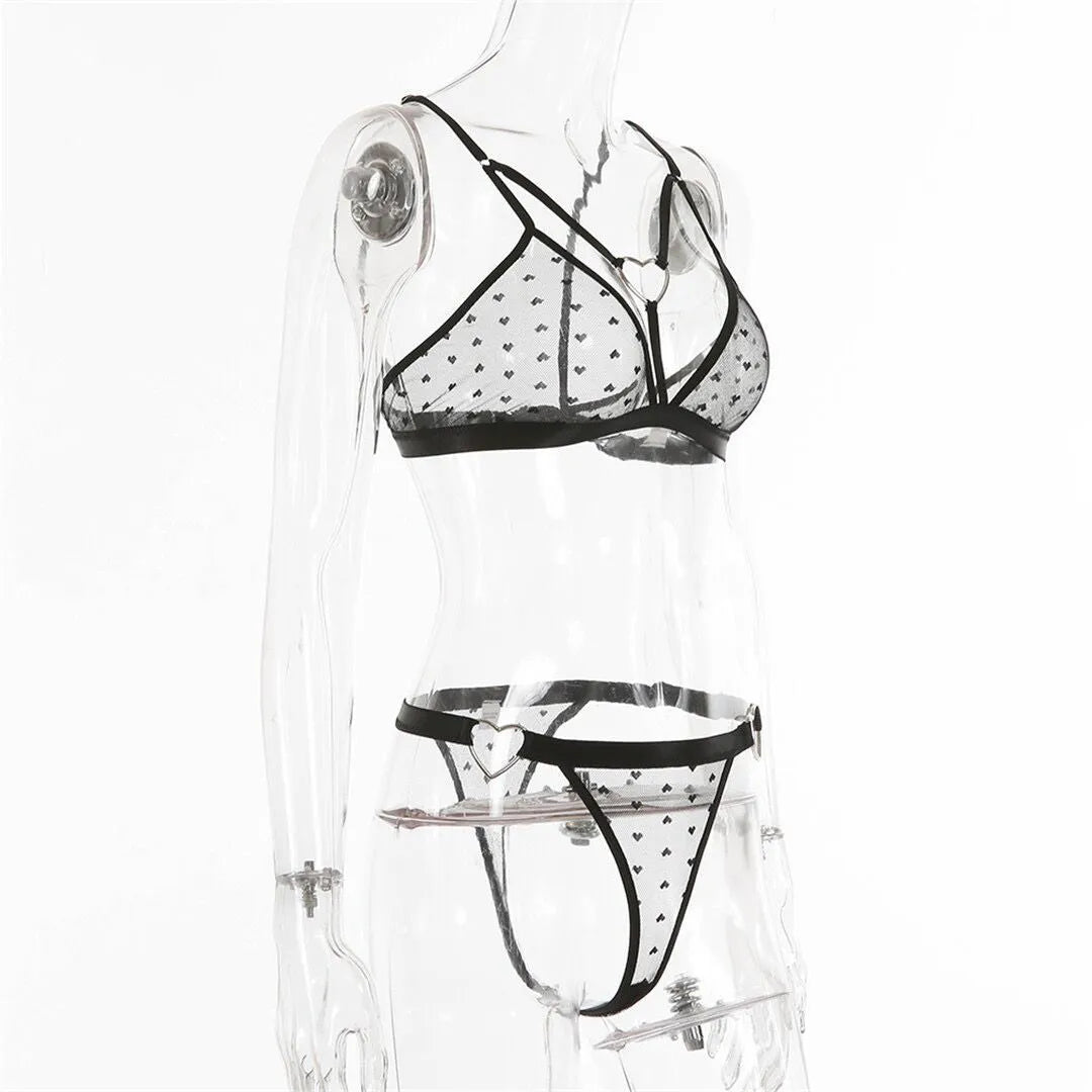 Ladies' black mesh two-piece spandex set showing top and trousers on a hanger