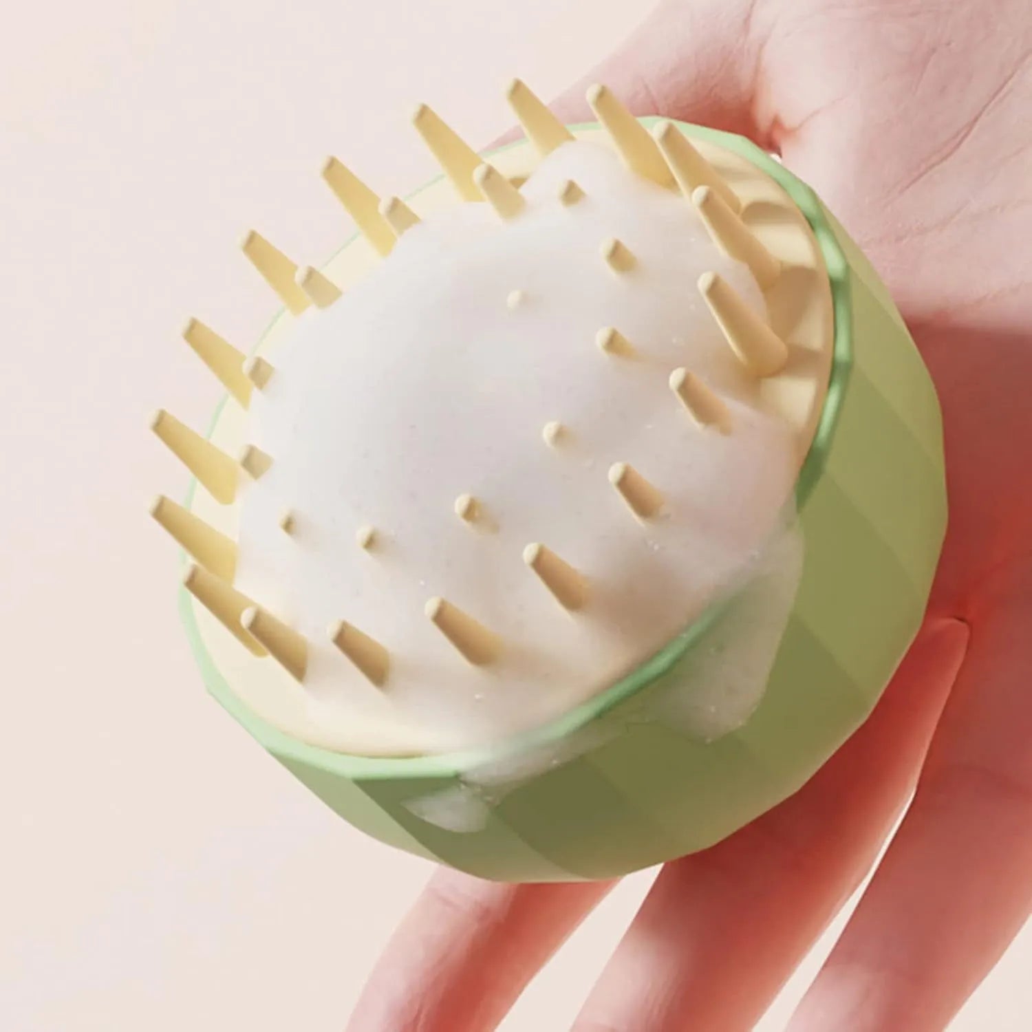 Green silicone pet bath massage brush with dual-sided head and drain holes