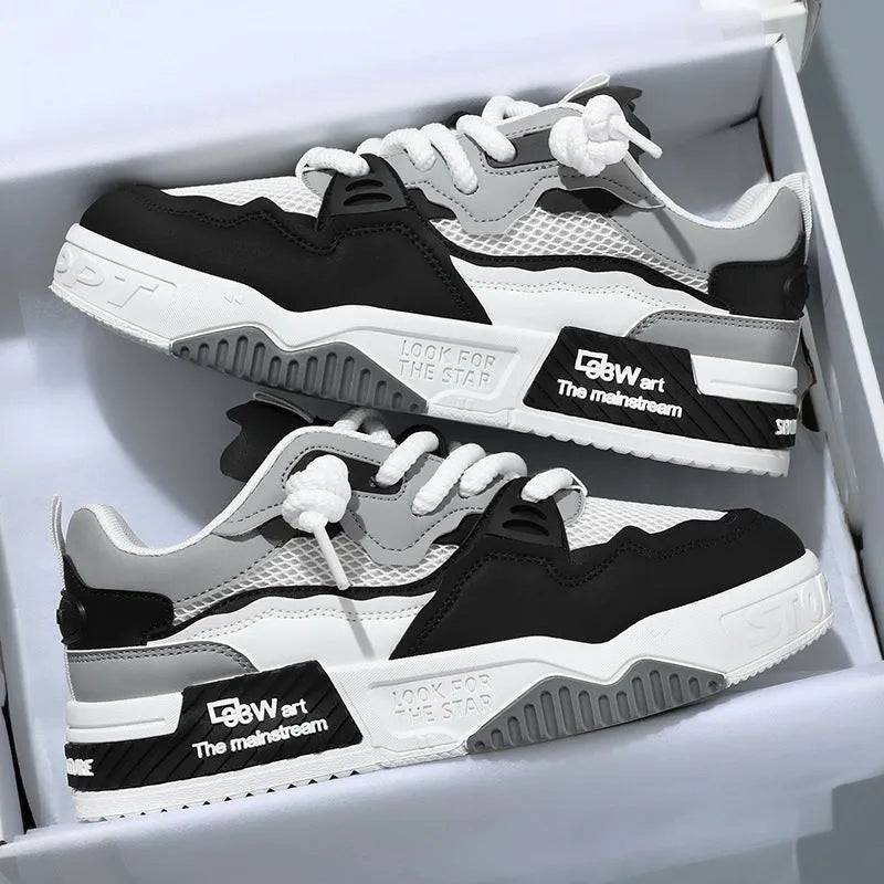Men's board shoes with rubber soles in low-top design, showing colour-matching pattern on upper
