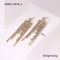 Women's stainless steel heart and star shaped earrings with electroplated 18K gold finish and geometric tassel design