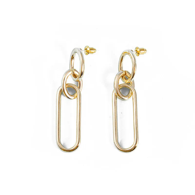Geometric sterling silver needle hoop earrings with ring and line design details