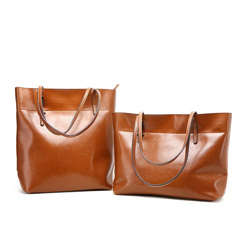 Wax cowhide leather handbag with cross-section design showing internal mobile phone pouch