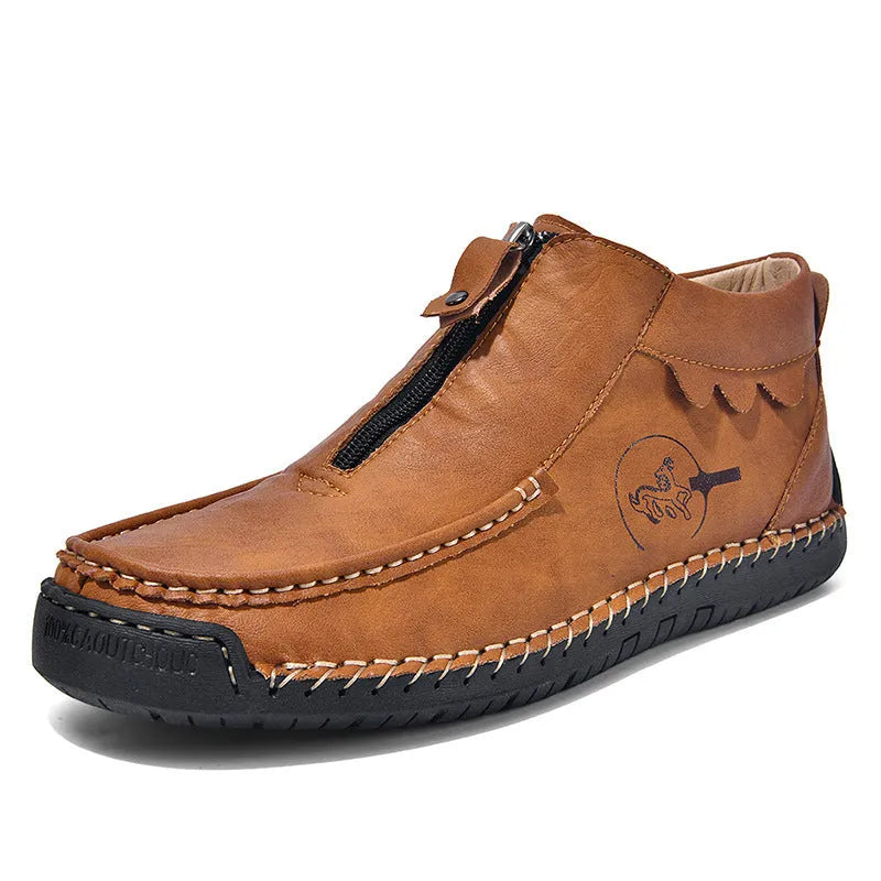 Men's black slip-on leather loafers with a round toe and visible stitching on a sewn rubber sole.