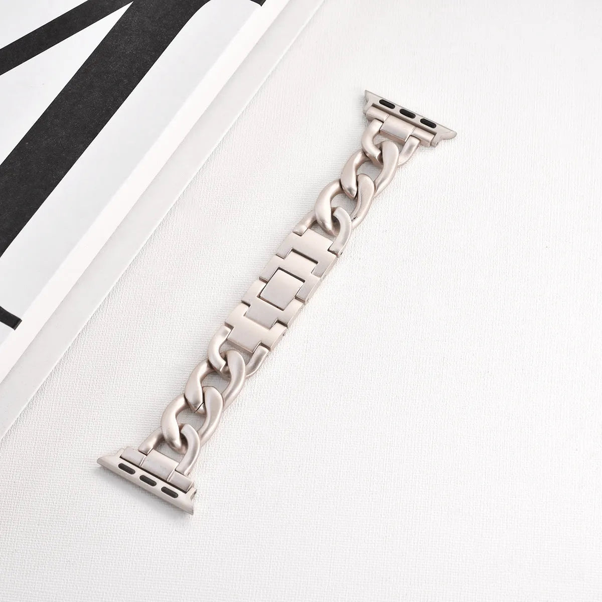 Silver metal chain strap for Apple Watch with 22mm connector on a watch case