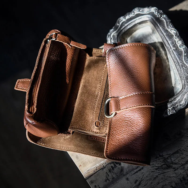Handmade vintage cow leather wallet in black or dark brown with tape closure.