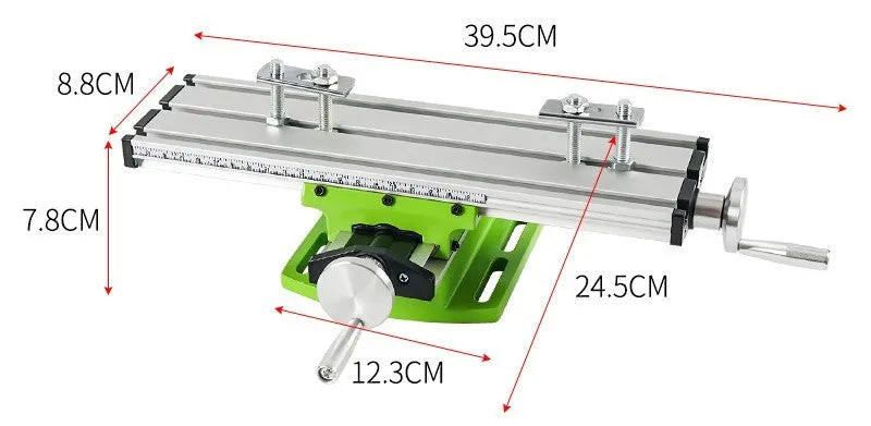Mini bench drill and milling machine with heavy-duty cross bench pliers on workshop bench