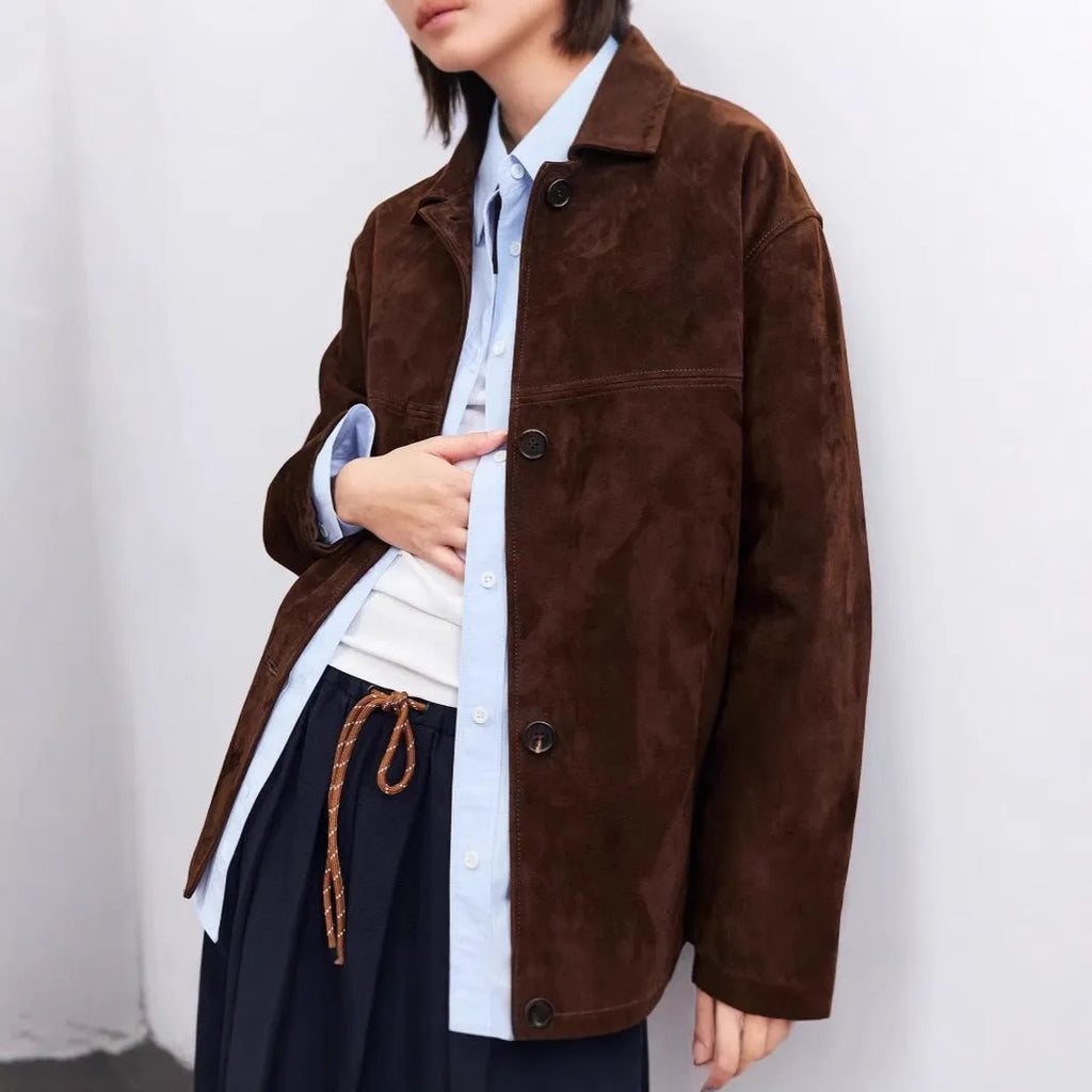 Women's retro style cashmere coat with peter pan collar and leather belt in loose mid-length fit