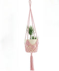 Hand-woven minimalist flower pot in raw cotton colour with an external net pocket for tools.