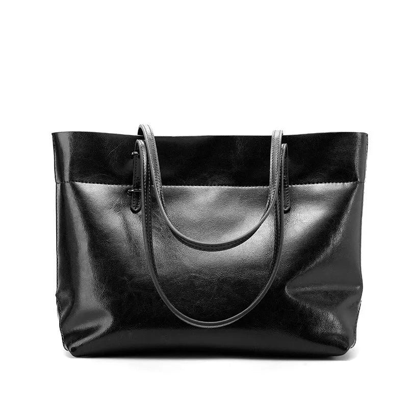 Wax cowhide leather handbag with cross-section design showing internal mobile phone pouch