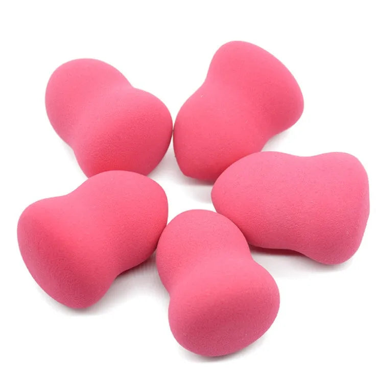 Pink hydrophilic non-latex makeup sponge for foundation application, shown at 4x4x5.6 cm size.