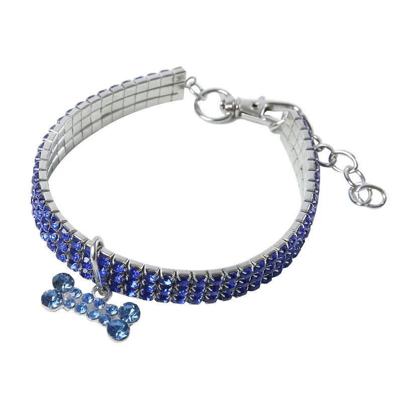 Bling rhinestone dog collar with crystal pendant on a small dog, blue colour, adjustable size S