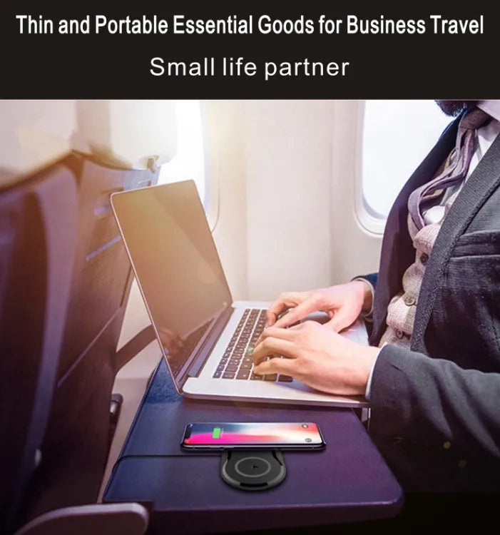 Black dual wireless charging pad charging two smartphones simultaneously on desk