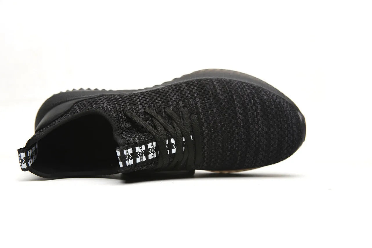 Low-top work safety shoes with steel toe cap and anti-static EVA soles in black colour.