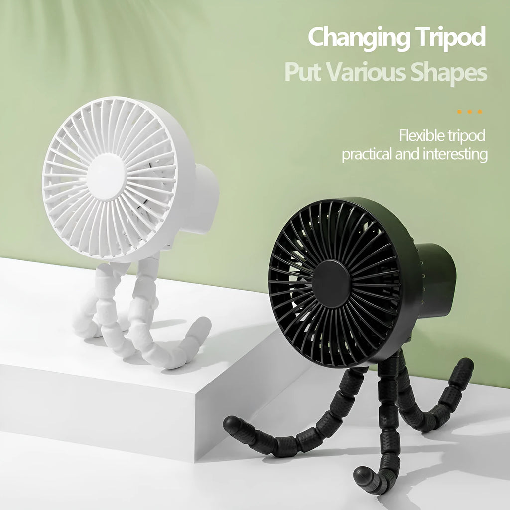 Black USB rechargeable desk fan with flexible tripod legs and an adjustable bending head on a wooden desk.