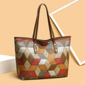 Women's large capacity PVC handbag in blue-brown colour with outer sandwich pockets