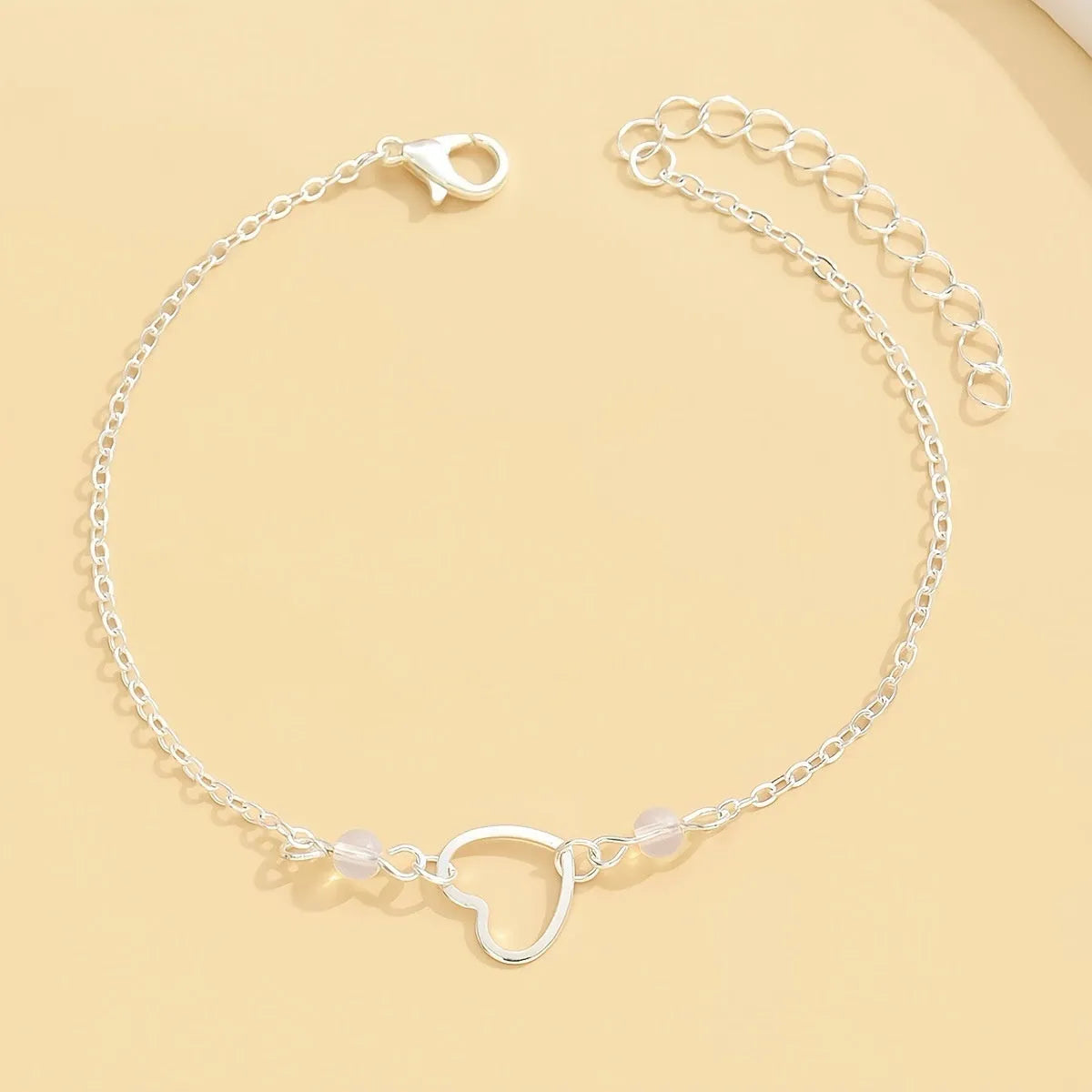 Gold or silver adjustable anklet with heart-shaped pendant, simple geometric women's jewellery
