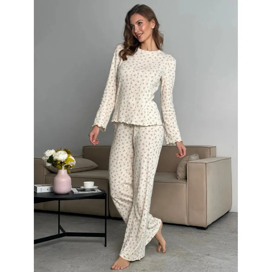 Women's white floral print pyjama set with bell sleeve top and wide-leg trousers