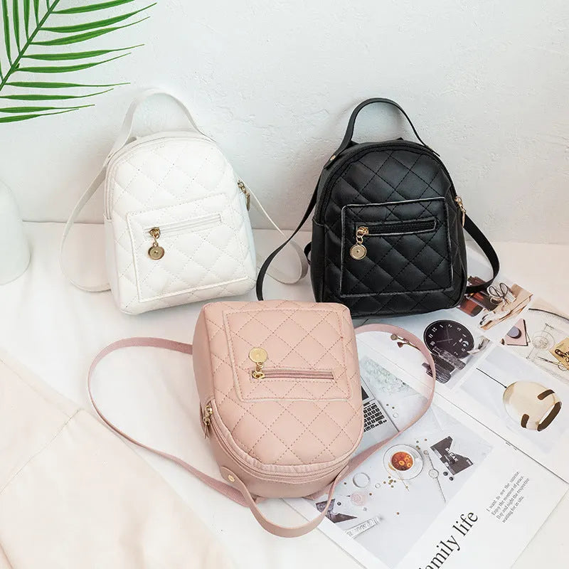 Korean style embroidered hard shell backpack for girls in black, pink, or white.