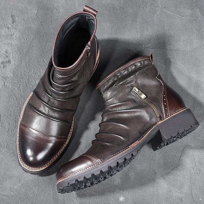 Black mid-calf cowboy boots with side zip, round toe, and embossed PU upper on a brown background.