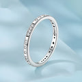 Silver ring with oxidised black moss texture and I Love You engraving on band.
