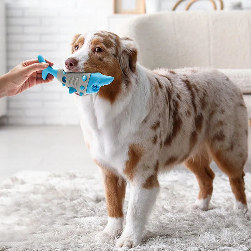 Blue shark-tooth textured dog teething toy with ventilation channels for puppy oral health