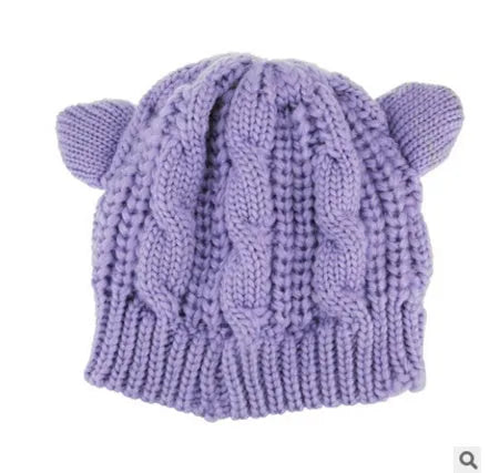 Hand-made 3D cat ear knitted beanie in multiple colours showing wool texture and ear design