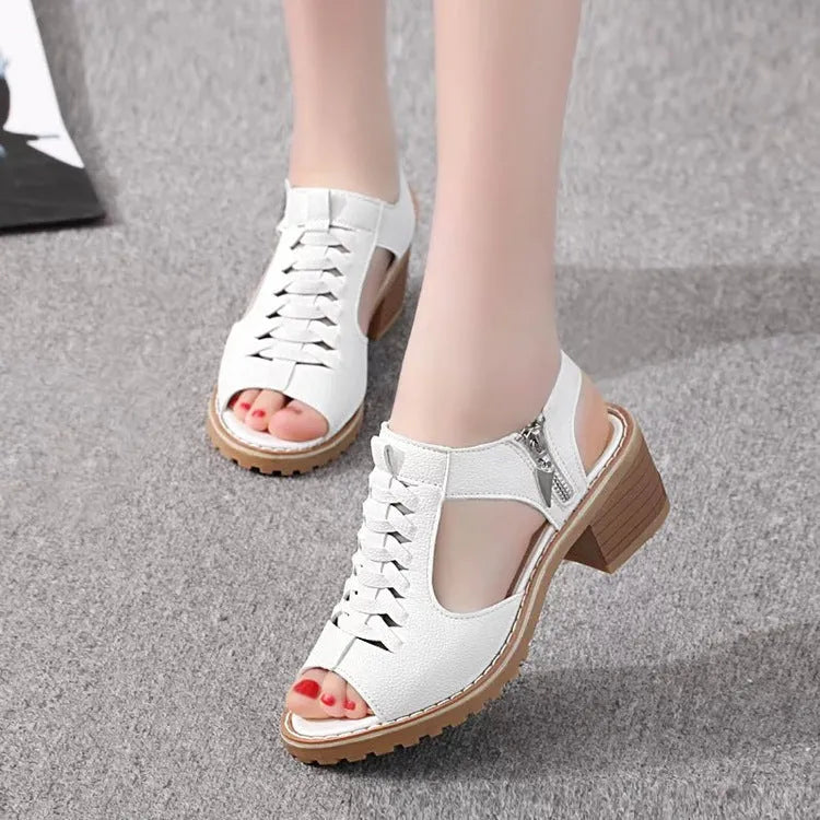 Women's retro sandals with a side zip in black, creamy white or white colours on a mid-heel.