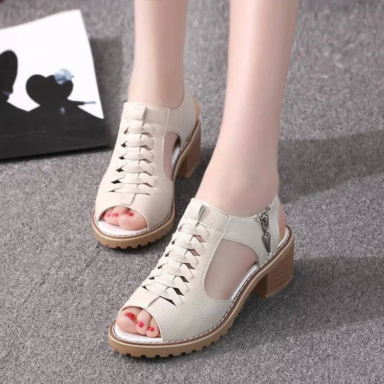 Women's retro sandals with a side zip in black, creamy white or white colours on a mid-heel.