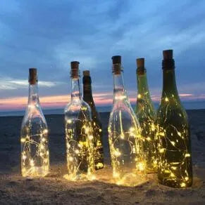 Bendable copper wire LED string light with 20 bulbs and a plastic bottle stopper for decorative lighting