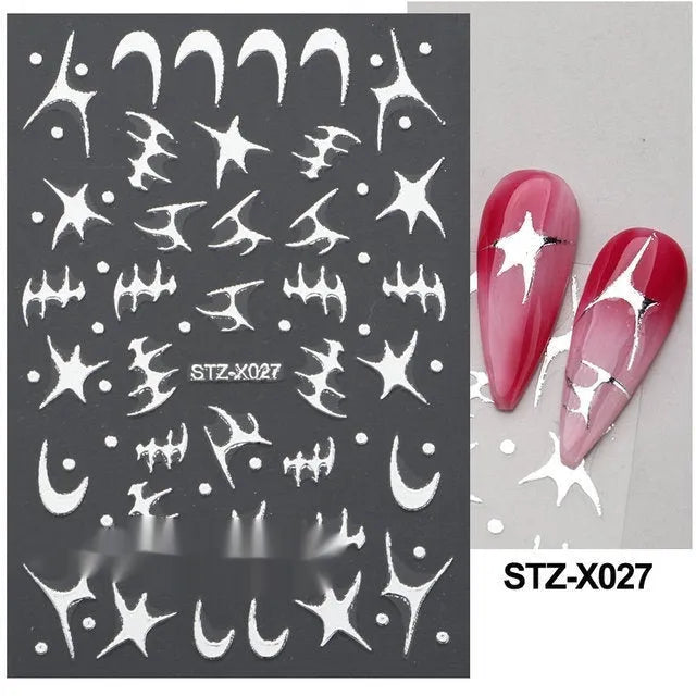 Set of 60 black and silver cartoon pattern nail strip stickers with plastic application patch.