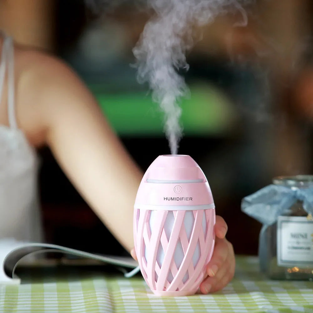 Football-shaped mini desktop humidifier in blue with USB cable