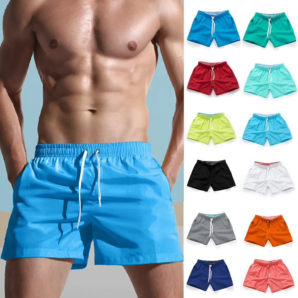 Men's straight-leg polyester beach shorts on a hanger, showing the classic fit and available in multiple solid colours.