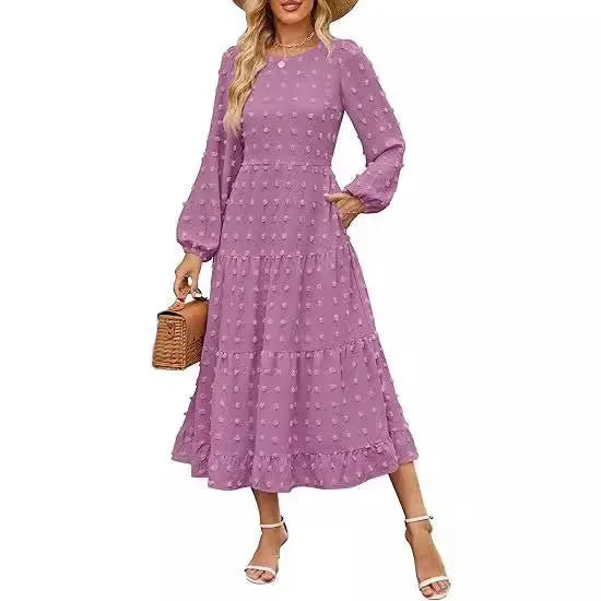 Beige long sleeve casual dress with ruffled sleeves, high waist, and round neck on a hanger.