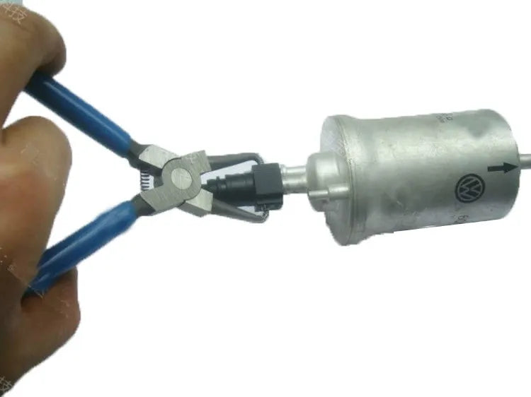 Iron and rubber caliper tubing pliers for automotive fuel line maintenance.