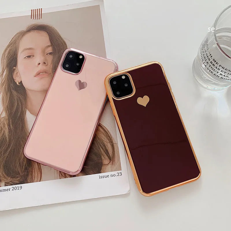 Slim TPU iPhone case in a solid colour with a luxury plating love design, shown fitted to a phone.