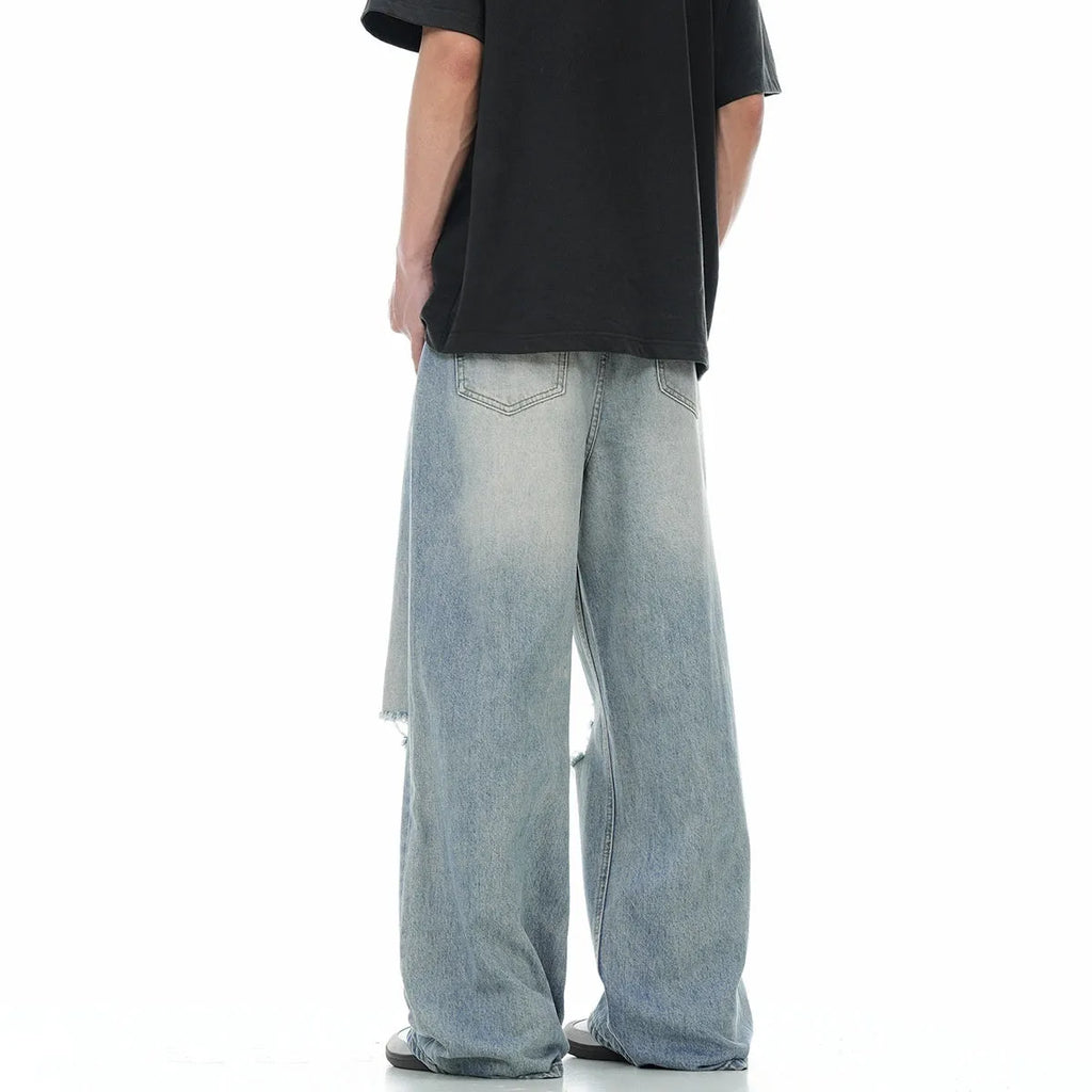 Blue straight-leg men's jeans with ripped detailing and retro summer styling