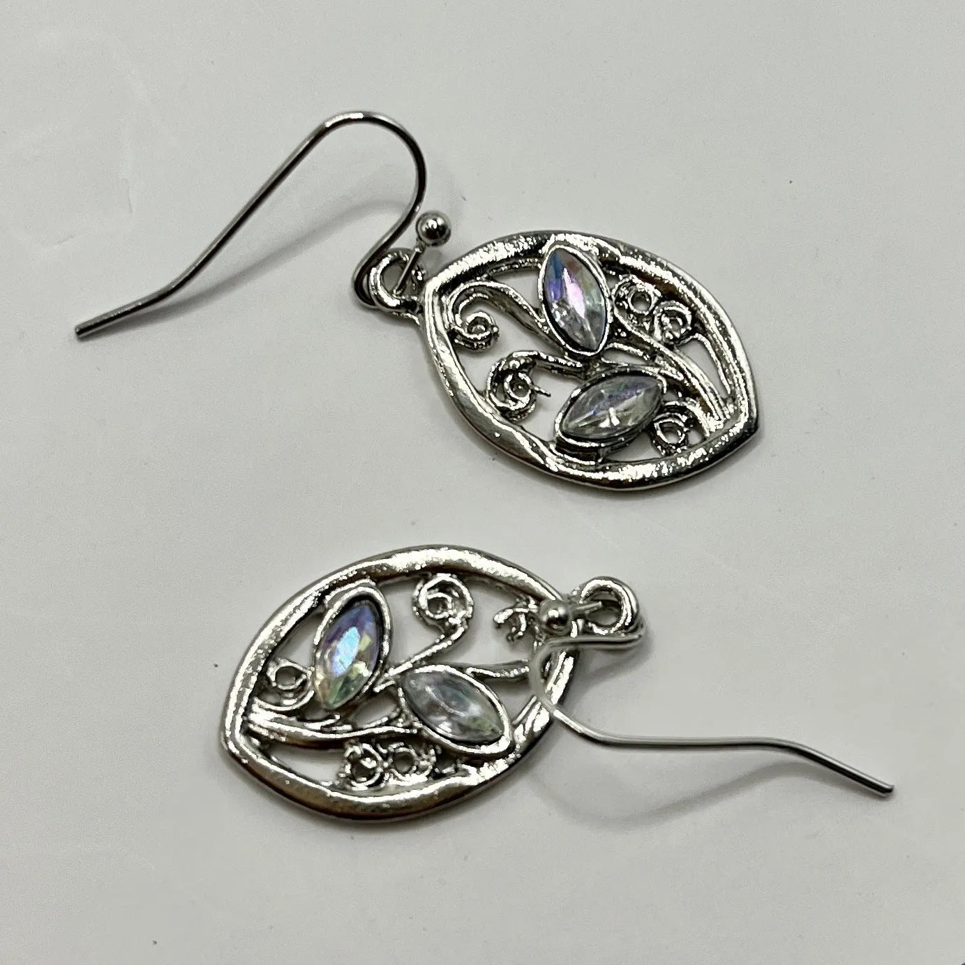Women's silver alloy earrings with colourful moonstone embedded in leaf design